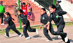 Students of The Millennium School participate in a race during the annual athletics meet at Sports Complex, Sector 7, Chandigarh, on Tuesday