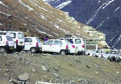 Tourists throng the Rohtang Pass. A file photograph