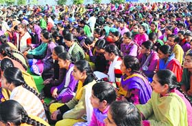 Women participate in an awareness campaign in Reasi on Tuesday