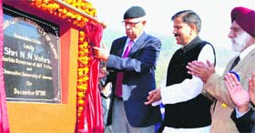 Governor NN Vohra unveils the plaque during the foundation stone-laying ceremony of the Ramnagar campus of the University of Jammu