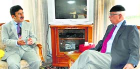 Governor NN Vohra interacts with Peerzada Mansoor Hussain, MLA Shangus, at Raj Bhawan