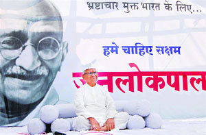 Social activist Anna Hazare on the first day of his indefinite fast for the Jan Lokpal Bill at Ralegan Siddhi village in Ahmednagar district of Maharashtra on Tuesday.