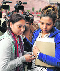 Captain Sunil James wife Aditi (L) and sister Anvi after meeting the PM at Parliament in New Delhi on Tuesday. Captain James is under arrest in the west African country of Togo since July on the charge of aiding pirates who had attacked and looted his Marshall Islands-flagged MT Ocean Centurion on July 16