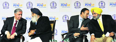 (From left) Kurush Grant, executive director, ITC, Chief Minister Parkash Singh Badal, Ness Wadia of the Wadia Group and Deputy Chief Minister Sukhbir Singh Badal on the last day of the investors summit in Mohali on Tuesday. Tribune photo: Manoj Mahajan