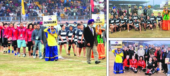 (Clockwise) Battle ground: Teams take part in the march past preceding the semifinals of the World Kabaddi Cup in Bathinda on Wednesday. The teams from New Zealand and Denmark pose with their officials before the matches