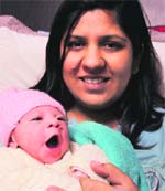 Nidhi with her newborn. Twenty-five babies were born in two hospitals in Chandigarh on Wednesday. Tribune photo: Manoj Mahajan