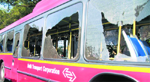 A bus damaged by protesters after a students death in Gurgaon on Wednesday. 