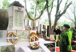 Major General VP Singh, GOC, Ace of spades, pays tributes to 1971 war martyrs. A Tribune photograph