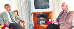 Governor NN Vohra interacts with Prof IA Hamal, VC, Baba Ghulam Shah Badshah University, at Raj Bhawan in Jammu on Wednesday. A Tribune photograph