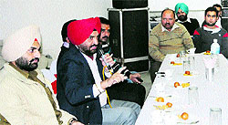 ADCP (City-II) Amrik Singh Pawar along with other police officials hold a meeting regarding beat patrolling system with the residents in Amritsar on Thursday