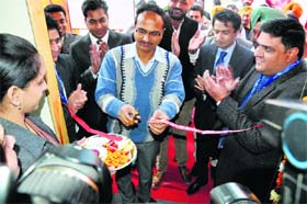 Chief Administrator, Bathinda Development Authority (BDA), Varinder Kumar Sharma, inaugurates the new branch of ING Vysya Bank in Bathinda on Thursday