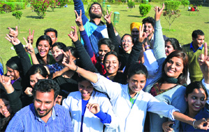 Students of Sri Dhanwantary Ayurvedic College, Chandigarh, in a jubilant mood after declaration of their result at Panjab University on Thursday. 