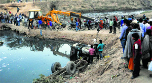 A tractor-trailer loaded with construction material fell into a nullah at Jagatpura village in Mohali on Thursday.