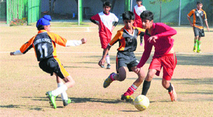 Players in action during a match for the St  Kabir Football Trophy in Chandigarh on Thursday. 