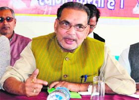 BJP general secretary and state in charge for the party affairs Radha Mohan Singh addresses a gathering in Haridwar on Thursday.