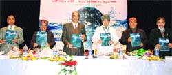Prof JB Joshi releases a souvenir during a conference at the NIT in Hamirpur on Thursday.