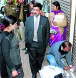 Health Department staff seal a nursing home on charges of the PNDT violations in Jalandhar on Thursday. A tribune Photograph