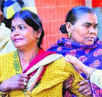 The victims mother, Suman Kumari, breaks down.