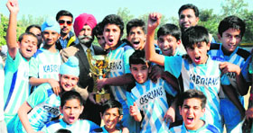 Players of St Kabir School in a jubilant mood after winning the final match of St Kabir Football Tournament held on the school campus in Sector 26, Chandigarh, on Friday.