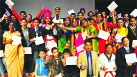 Students of Stepping Stones Senior Secondary School in a jubilant mood after receiving prizes during the 30th annual day function of the school held at Tagore Theatre, Sector 18, Chandigarh, on Friday.