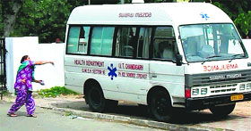 A woman pelts an ambulance with a stone following the death of a patient at the GMSH, Sector 16, Chandigarh.