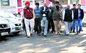 Mayor Subhash Chawla inspects repair work at the Sector 19-C market in Chandigarh.