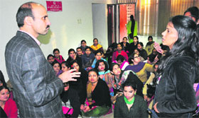 Computer teachers make a point during their meeting with Kamlesh Kumar, Director Public Instructions (Schools), at his office in Sector 9, Chandigarh, on Friday.