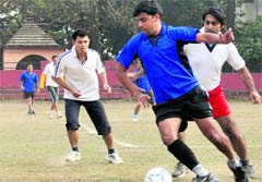 Players in action in a match during the Inter-Department Football Tournament organised by the ONGC Karamchari Kalyan Samiti in Dehradun on Friday. A Tribune photograph