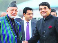 Afghanistan President Hamid Karzai (left) is received by Minister of State for Home R.P.N. Singh in Delhi on Thursday. Karzai's visit to India is another reminder for Delhi as to what's at stake in the unfolding great game in South Asia. PTI