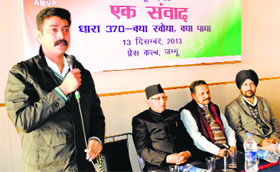 A speaker debates Article 370 during a seminar in Jammu on Friday.