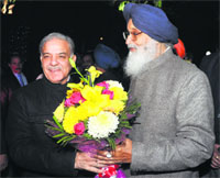 Chief Minister Parkash Singh Badal greets his Pakistan Punjab counterpart Shahbaz Sharif (left) in Mohali on Friday.