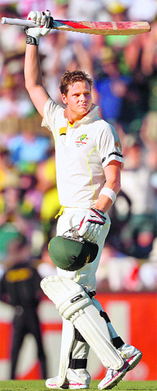 Steve Smith (103*) celebrates his century.