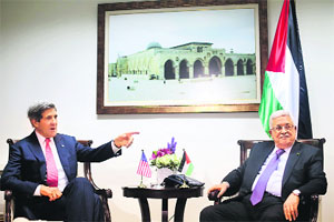 Palestinian President Mahmud Abbas (right) with US Secretary of State John Kerry in the West Bank city of Ramallah on Thursday.