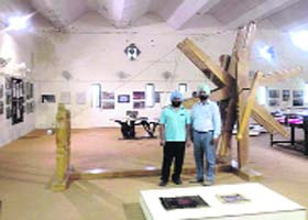 Charanjit Singh (right) with the spinning wheel at Central University of Punjab (CUP) in Bathinda
