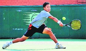 A player returns a shot during a match at CLTA, Sector 10, Chandigarh, on Saturday