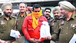 One of the accused in the Jalandhar police custody. A Tribune photograph