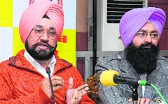 Members of the Headmasters Union speak to the media about their demands in Jalandhar on Saturday. Photo: Sarabjit Singh