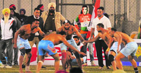 The Indian men (top) beat Pakistan 48-39 to win the World Cup Kabaddi
