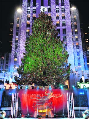 The Christmas tree is lit during 81st Annual Rockefeller Centre Christmas Tree Lighting Ceremony at Rockefeller Center in New York City