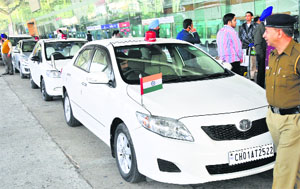 VIP vehicles parked in the pick-and-drop area at the Chandigarh airport on Sunday
