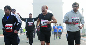 Delhiites during the Airtel Delhi Half Marathon in New Delhi on Sunday.
