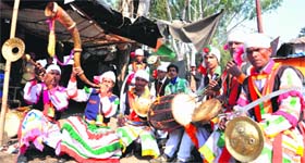 Folk artistes from the Kumaon region perform during the Narendra Modis rally at Parade Ground in Dehradun on Sunday