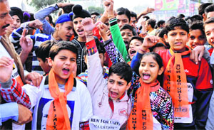 Children participate in the Run for Unity in Jammu on Sunday