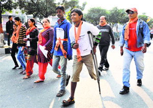 a differently abled youth takes part in the race.