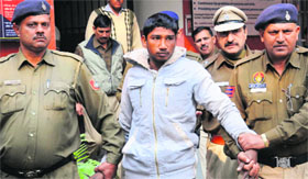 Accused Shankar in police custody in Chandigarh on Monday.