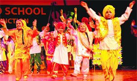 Students perform during the annual function of KPS World School, Mohali, at the Tagore Theatre in Chandigarh on Monday.