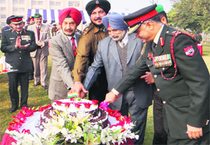 Army officials celebrate Vijay Diwas at the Vajra Corps Headquarters in Jalandhar Cantonment on Monday.