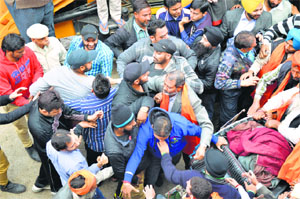 Supporters of BJP councillor Gurdeep Singh Neetu and former Health Minister Sat Pal Gosain enter into a scuffle on Monday.