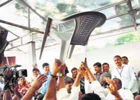 Pro and anti-Telangana MLAs clash after the tabling of the Telangana Bill in Andhra Pradesh Assembly in Hyderabad on Monday