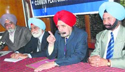 Members of the All-India Defence Brotherhood at a press conference in Chandigarh on Monday. Tribune photo: Manoj Mahajan